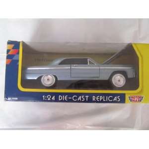  1964 Chevrolet Impala Aqua 1:24: Toys & Games