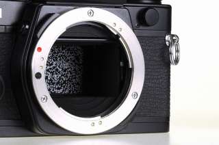 Black Olympus OM 4Ti Camera + Zuiko Auto S 50mm F/1.4 Lens  