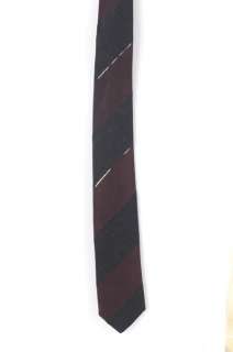 tie. Dark stripes, 100% silk, made in France, slim style. Tie shows 