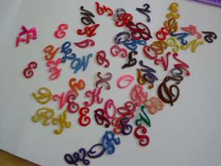 Here is a picture of some of the bows that I ironed some letters on 