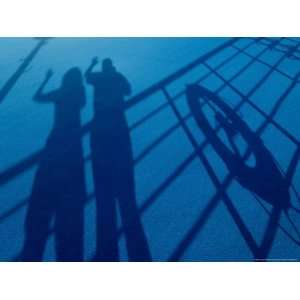  Shadow of Two People Waving Next to a Life Preserver on 