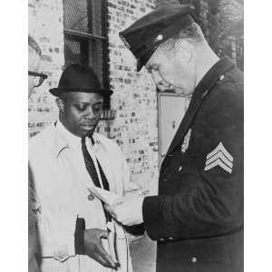  1965 Joseph X talking to cop showing him court order to 