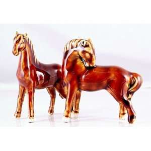    Pair of Wade style horse figurines unmarked