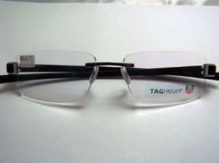   TAG HEUER 7106 001 BRUSHED BLACK RIMLESS TITNAIUM EYEGLASSES Clothing