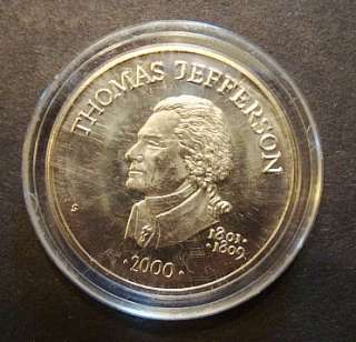   OF LIBERIA FIVE DOLLARS COIN THOMAS JEFFERSON. SIZE 1 3/16 DIAMETER