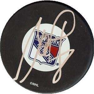Marek Malik autographed Hockey Puck (New York Rangers):  