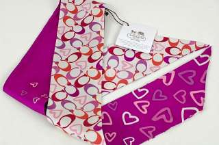 It comes new with tags, box, and bag. This heart scarf is great tied 