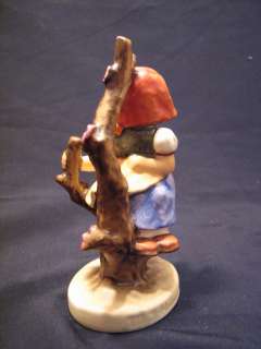  figurine titled Apple Tree Girl with trademark #5. The base could 