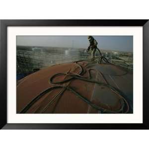  A Laborer Works at an Oil Refinery in Saudi Arabia 