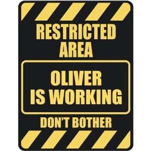   RESTRICTED AREA OLIVER IS WORKING  PARKING SIGN