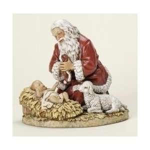  8.75 The Kneeling Santa with Baby Jesus Christmas Figure 