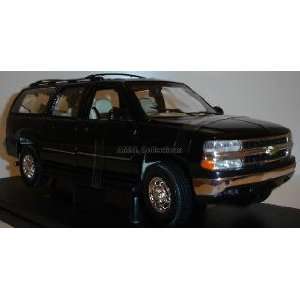   Suburban (Black) 1:18 scale diecast car by Welly: Toys & Games