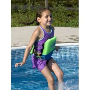  5 Year Old Girl Jumping Off Diving Board into Swimming 